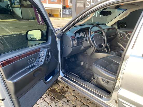 JEEP-GRAND CHEROKEE-4.7 LIMITED 4X4 V8 16V GASOLINA 4P AUTOMÁTICO JEEP-GRAND CHEROKEE-2004