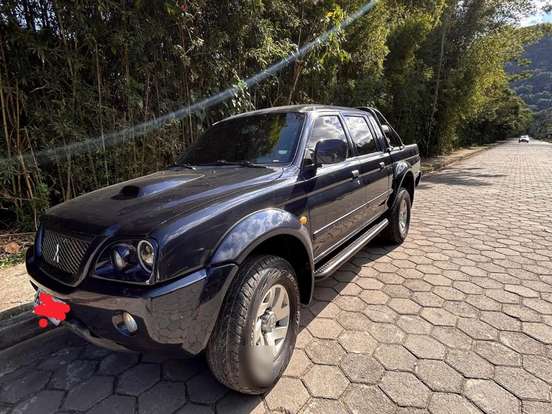 MITSUBISHI-L200-2.5 SPORT HPE 4X4 CD 8V TURBO INTERCOOLER DIESEL 4P AUTOMÁTICO MITSUBISHI-L200-2004