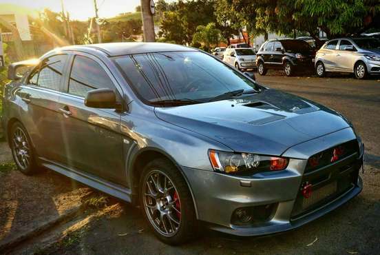MITSUBISHI-LANCER-2.0 EVOLUTION X 4X4 16V TURBO INTERCOOLER GASOLINA 4P AUTOMÁTICO MITSUBISHI-LANCER-2011