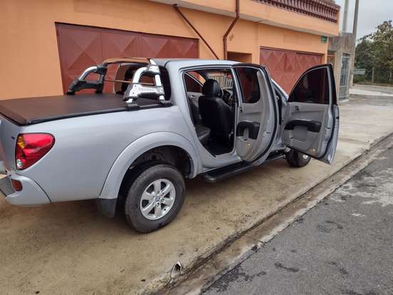 MITSUBISHI-L200 TRITON-3.2 HPE 4X4 CD 16V TURBO INTERCOOLER DIESEL 4P AUTOMÁTICO MITSUBISHI-L200 TRITON-2013