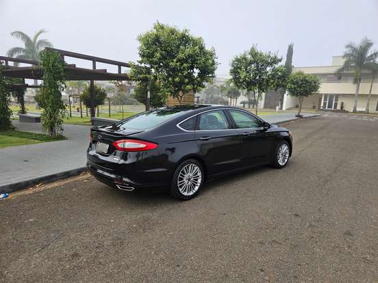 FORD-FUSION-2.0 TITANIUM FWD 16V GASOLINA 4P AUTOMÁTICO FORD-FUSION-2014