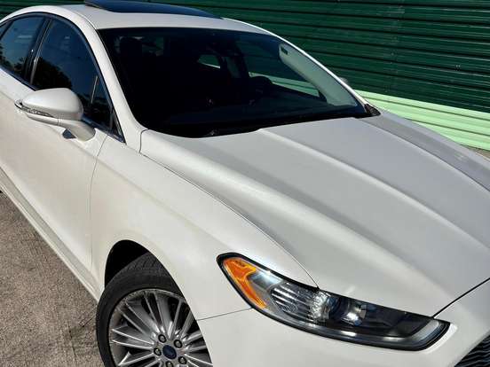 FORD-FUSION-2.0 TITANIUM FWD 16V GASOLINA 4P AUTOMÁTICO FORD-FUSION-2015