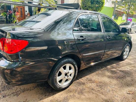 TOYOTA-COROLLA-1.8 SE-G 16V GASOLINA 4P AUTOMÁTICO TOYOTA-COROLLA-2004