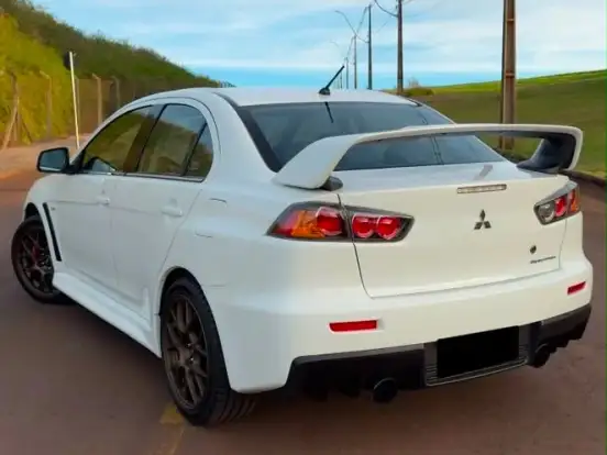 MITSUBISHI-LANCER-2.0 EVOLUTION X 4X4 16V TURBO INTERCOOLER GASOLINA 4P AUTOMÁTICO MITSUBISHI-LANCER-2013