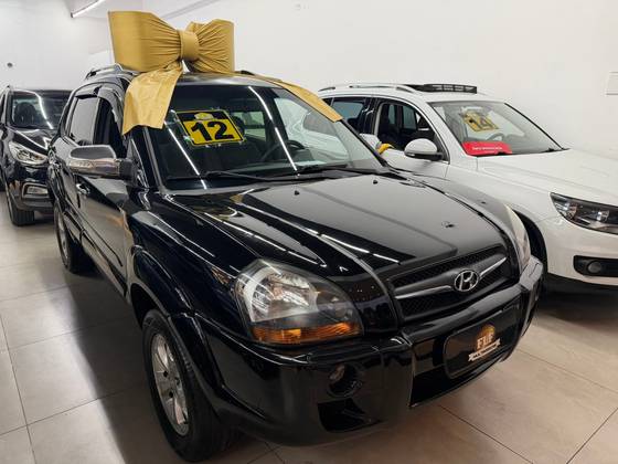 HYUNDAI TUCSON 2.0 MPFI GLS 16V 143CV 2WD GASOLINA 4P AUTOMÁTICO HYUNDAI TUCSON 2.0 MPFI GLS 16V 143CV 2WD GASOLINA 4P AUTOMÁTICO