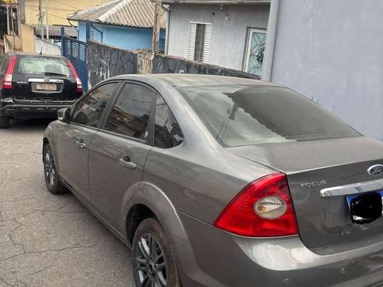 FORD-FOCUS-2.0 GHIA SEDAN 16V GASOLINA 4P AUTOMÁTICO FORD-FOCUS-2009
