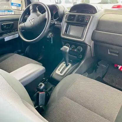 MITSUBISHI-PAJERO TR4-2014