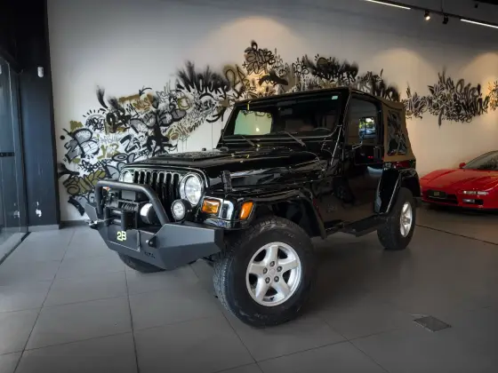 JEEP WRANGLER 4.0 SPORT 4X4 TETO LONA 6I 12V GASOLINA 2P AUTOMÁTICO