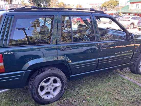 JEEP-GRAND CHEROKEE-5.9 LIMITED LX 4X4 V8 16V GASOLINA 4P AUTOMÁTICO JEEP-GRAND CHEROKEE-1998