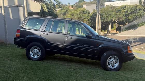 JEEP GRAND CHEROKEE 5.9 LIMITED LX 4X4 V8 16V GASOLINA 4P AUTOMÁTICO