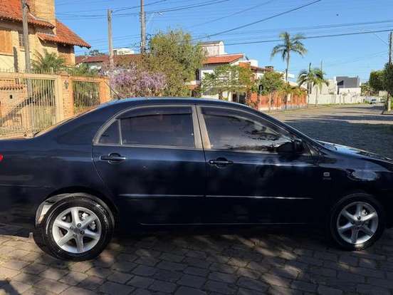 TOYOTA-COROLLA-1.8 SE-G 16V GASOLINA 4P AUTOMÁTICO TOYOTA-COROLLA-2004