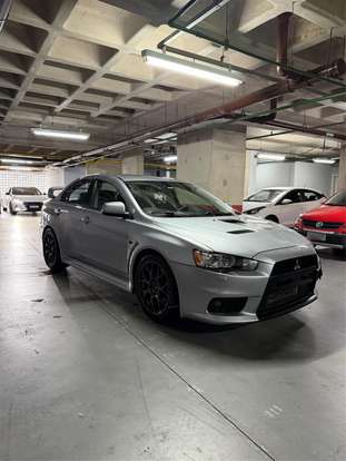MITSUBISHI-LANCER-2.0 EVOLUTION X 4X4 16V TURBO INTERCOOLER GASOLINA 4P AUTOMÁTICO MITSUBISHI-LANCER-2011