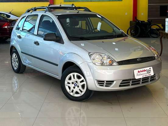 FORD-FIESTA-1.0 MPI PERSONNALITÉ 8V GASOLINA 4P MANUAL FORD-FIESTA-2004