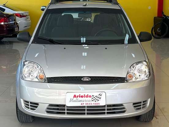 FORD-FIESTA-1.0 MPI PERSONNALITÉ 8V GASOLINA 4P MANUAL FORD-FIESTA-2004