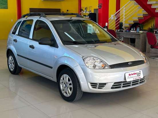 FORD-FIESTA-1.0 MPI PERSONNALITÉ 8V GASOLINA 4P MANUAL FORD-FIESTA-2004