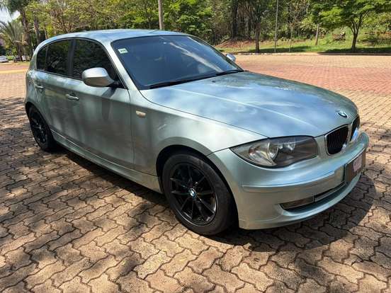 BMW-118i-1.8 UE71 16V GASOLINA 4P AUTOMÁTICO BMW-118i-2009