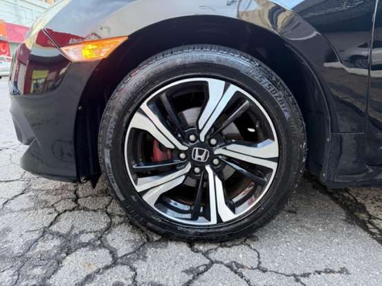 HONDA-CIVIC-1.5 16V TURBO GASOLINA TOURING 4P CVT HONDA-CIVIC-2018