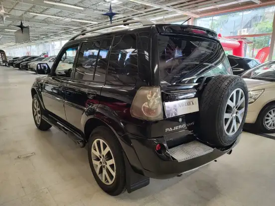 MITSUBISHI-PAJERO TR4-2013