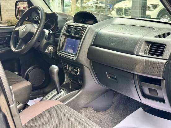 MITSUBISHI-PAJERO TR4-2.0 4X4 16V 140CV FLEX 4P AUTOMÁTICO MITSUBISHI-PAJERO TR4-2011