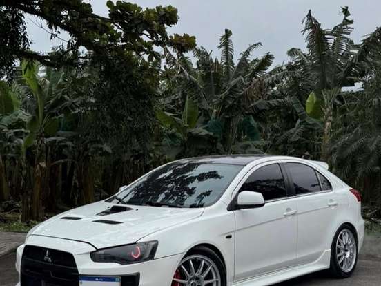 MITSUBISHI-LANCER-2.0 EVOLUTION X 4X4 16V TURBO INTERCOOLER GASOLINA 4P AUTOMÁTICO MITSUBISHI-LANCER-2011