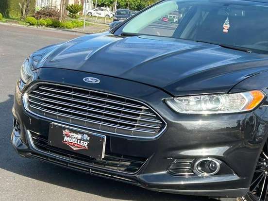 FORD-FUSION-2.0 TITANIUM FWD 16V GASOLINA 4P AUTOMÁTICO FORD-FUSION-2014
