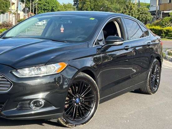 FORD-FUSION-2.0 TITANIUM FWD 16V GASOLINA 4P AUTOMÁTICO FORD-FUSION-2014