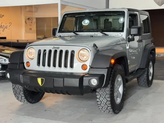 JEEP WRANGLER 3.8 UNLIMITED SPORT 4X4 CAPOTA DUPLA V6 GASOLINA 2P AUTOMÁTICO