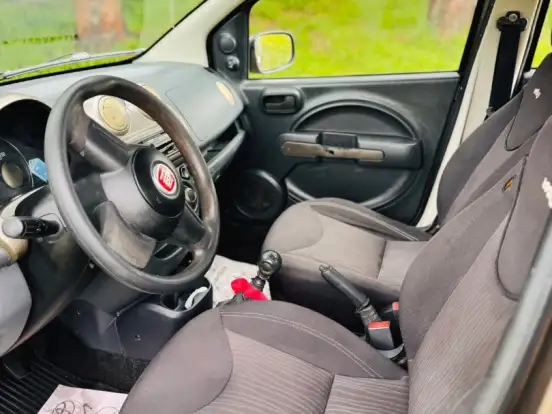FIAT-UNO-1.0 MPI MILLE WAY ECONOMY 8V FLEX 4P MANUAL FIAT-UNO-2010